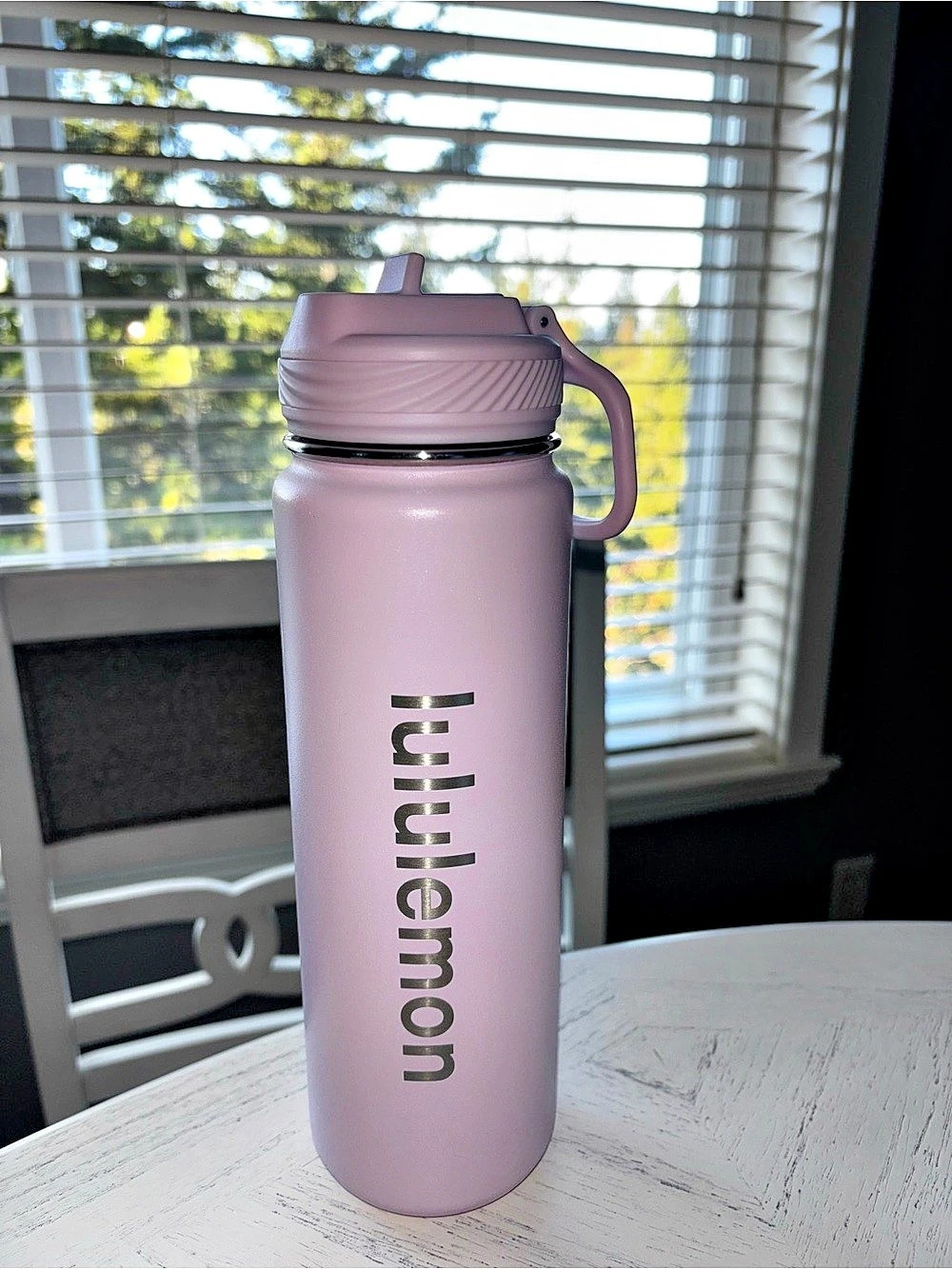 baby pink Lululemon 24oz straw lid bottle
